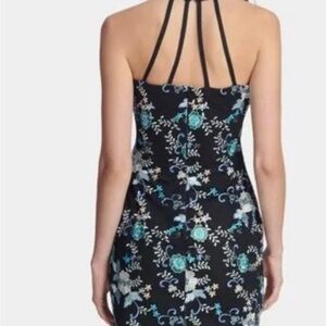 Embroidered blossoms brighten up this bodycon dress from GUESS.